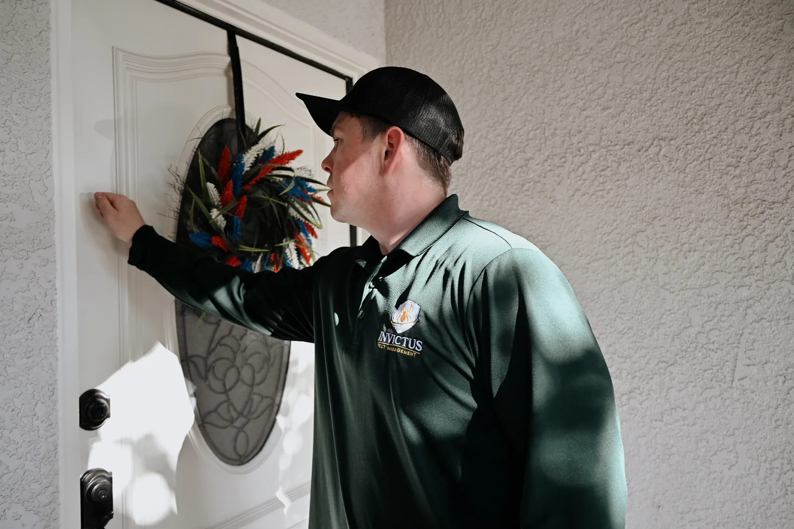 Invictus technician arriving at a customer's front door