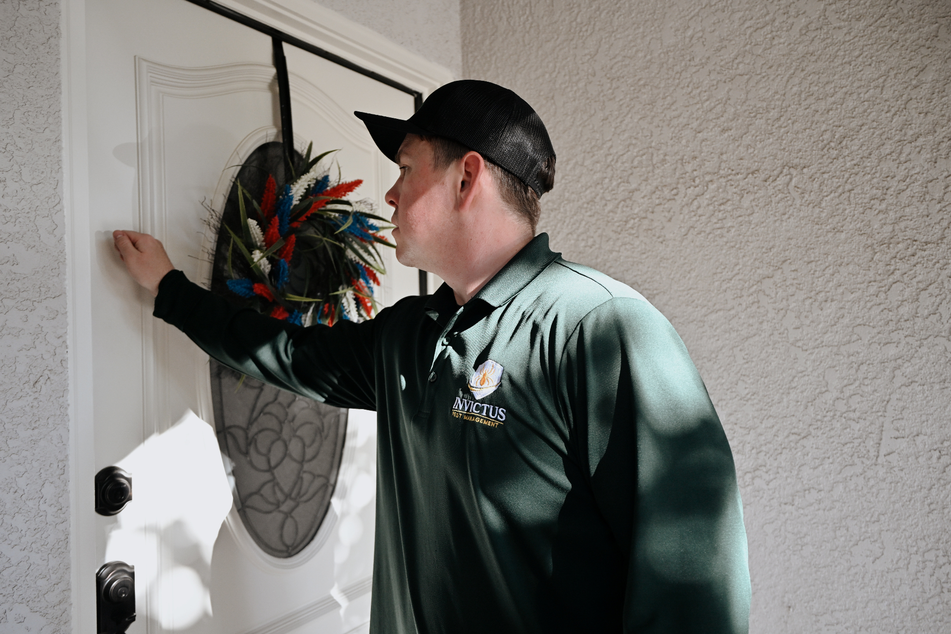 Invictus technician arriving at a customer's front door