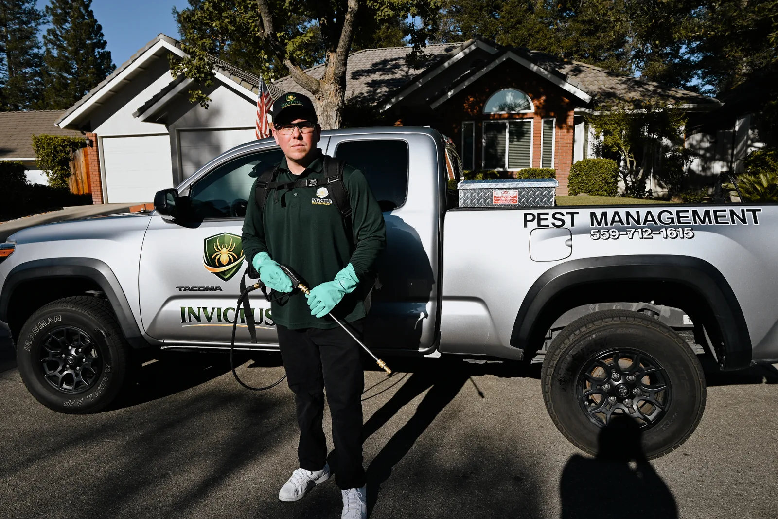 Invictus Pest Management technician with service truck